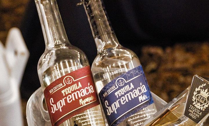 La Supremacía Tequila bottles at an event